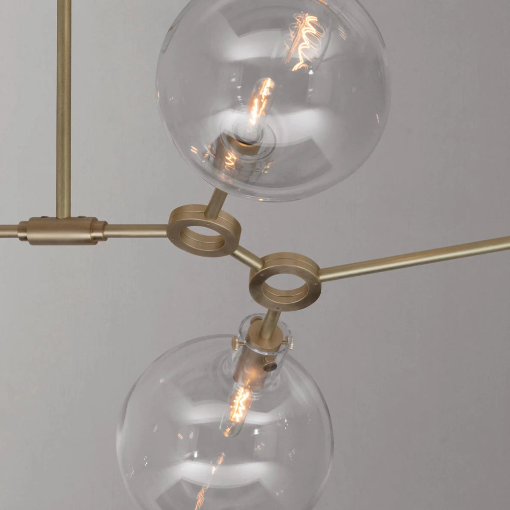 modern chandelier in Brushed brass ORA 6 pendant detail by KAIA