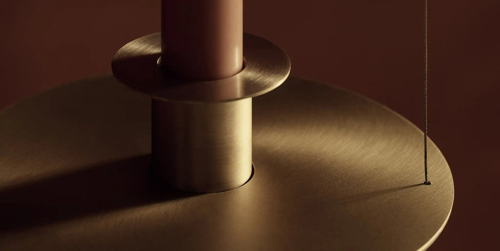 Detail of KAIA's CandleLight Pendant light in brushed brass
