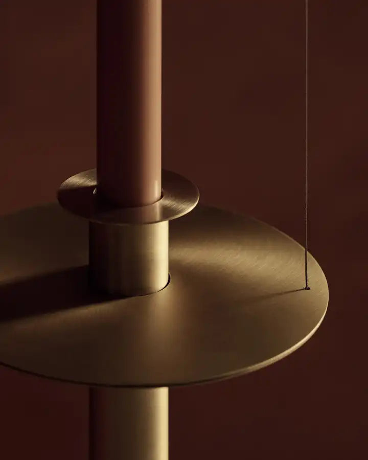 Detail of KAIA's CandleLight Pendant light in brushed brass resized for mobile screen