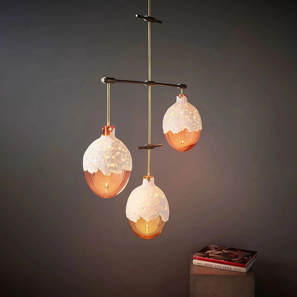 luxury modern chandelier in brass LUNAR GLOW roomset by KAIA 