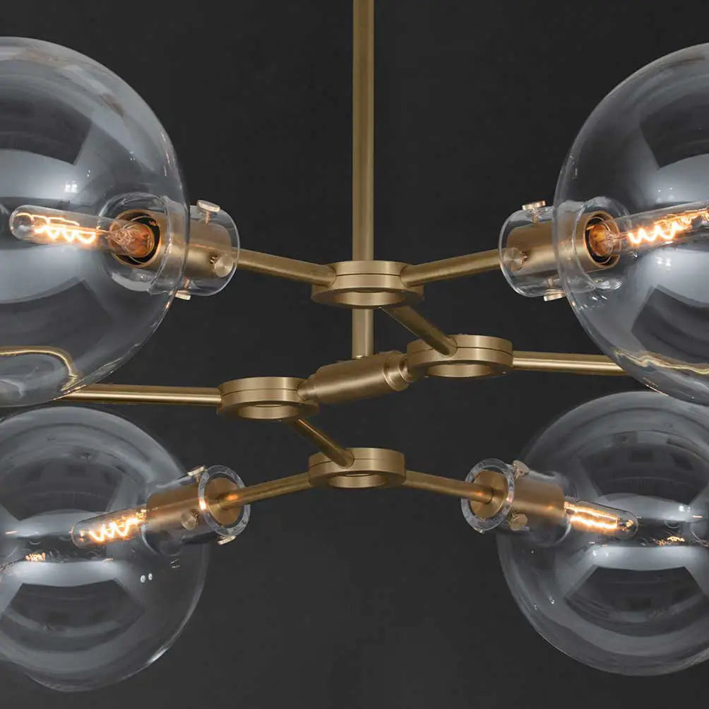modern glass chandelier in Brushed brass ORA round detail by KAIA